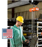 CM electric chain hoist single phase in use by worker with yellow hard hat lifting metal in warehouse
