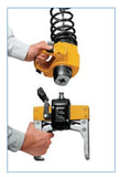 Demag DCM-Pro Manulift hoist for material handling with ergonomic yellow control handle