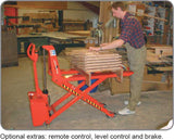 Interthor Thork-Lift material handling equipment lifting wooden pallets in workshop